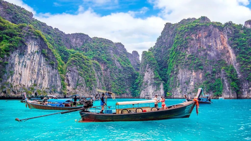 long-boat-and-tourist-at-maya-bay-in-phi-phi-island-photo-taken-on-december-1-2016-in-krabi-thailand